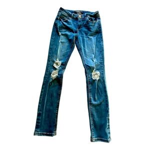 {Indigo Rein} lightly distressed mid rise skinny jean